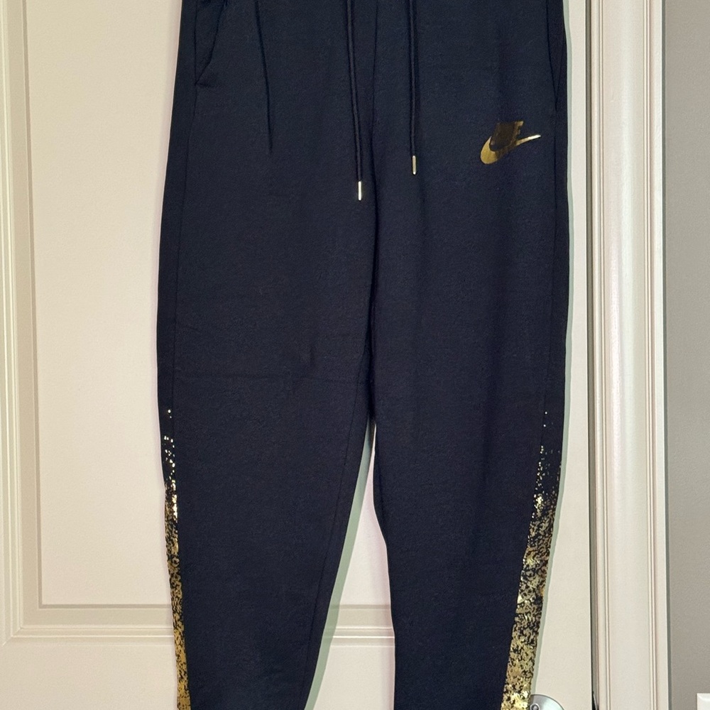 Nike Black and Gold Joggers with Tapered Fit